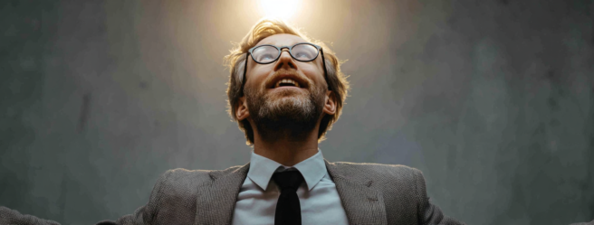 Enthusias A man in a business suit having a eureka moment f4322e71 1ddb 40ff bc55 981eff749c0a 2