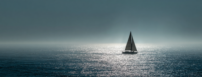 Enthusias A sailboat on the Pacific Ocean There is no wind t e8079c39 c9ed 4ea3 957c be77b8002ac6 0